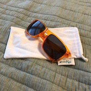 Orange Oakley sunglasses!